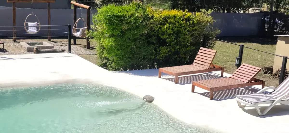 Piscina climatizada en cabañas en Los Reartes